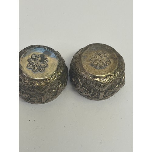 19 - a pair of Burmese silver temple pots
