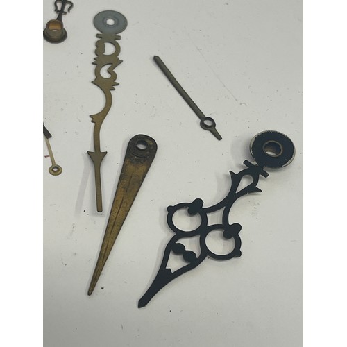 13 - a bag of watch / clock parts