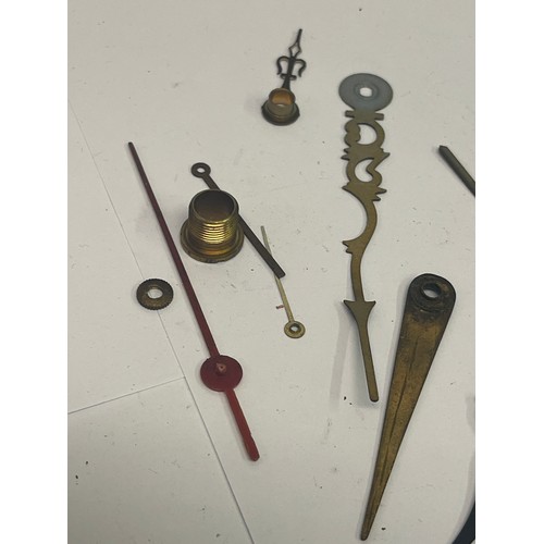 13 - a bag of watch / clock parts