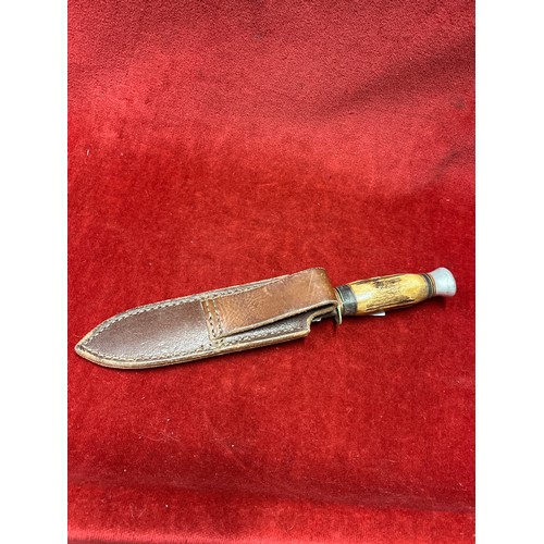 46 - A pre war British Hunting knife with antler handle & leather scabbard. Blade 15cm
