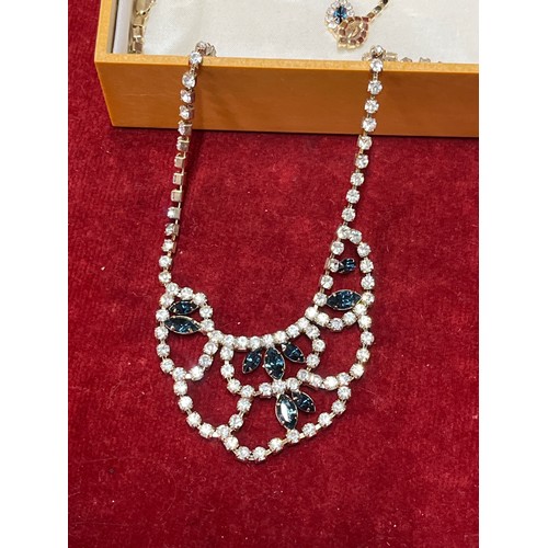 30 - Two parure jewellery sets including necklace & earrings with deep blue & clear crystals and bracelet... 