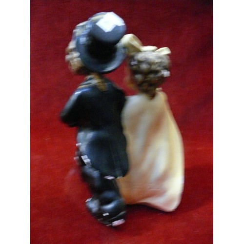 9 - Vintage chalkware figurine of a boy and girl dressed as a bride and groom, likely American early 20t... 