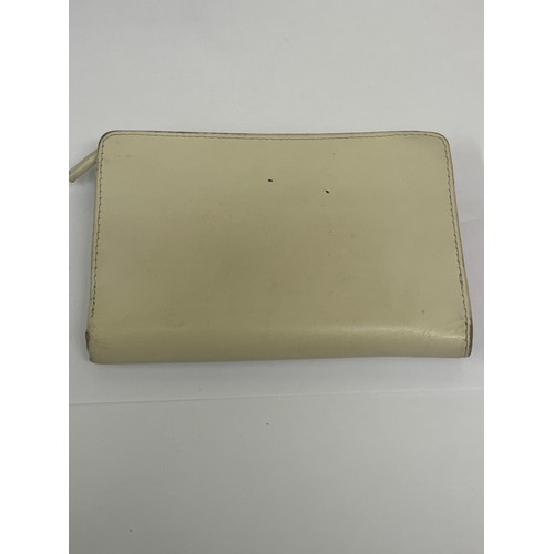 24 - A leather purse by Radley