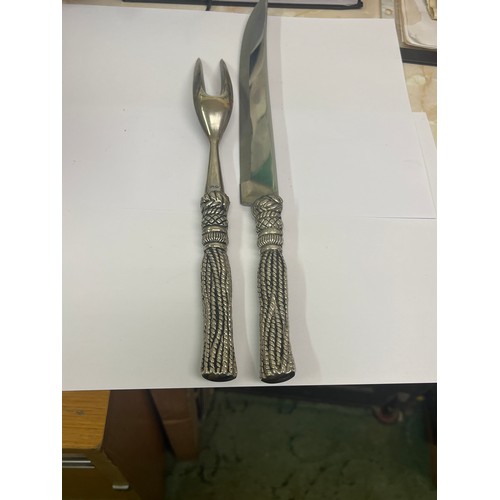 19 - A carving knife & fork set by Silea with rope tassel handles