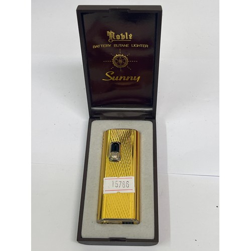 17 - 3 lighters including Colibri of London Quantum (boxed with paperwork), Sunny Noble gold plated light... 