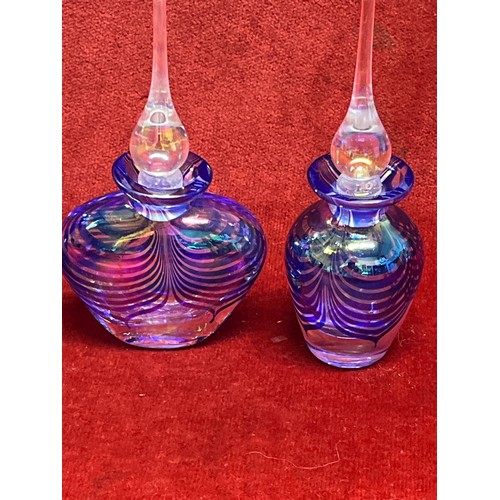 46 - 4 iridescent blue scent bottles with tear drop stoppers