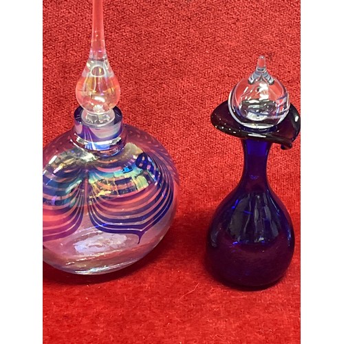46 - 4 iridescent blue scent bottles with tear drop stoppers
