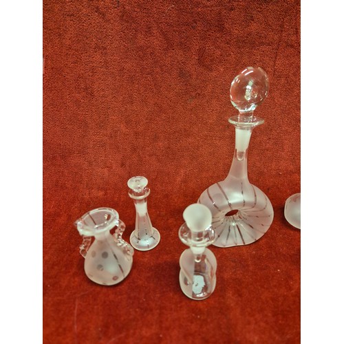48B - Collection of 8 frosted glass scent bottles