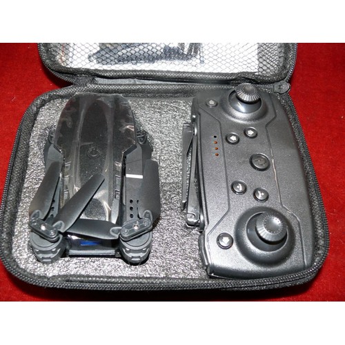 80 - Folding drone with instructions in carry case