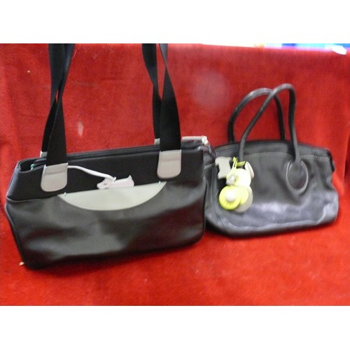 85 - 2 Black Radley handbags - 1 leather with green tags and the other with blue dog and trim