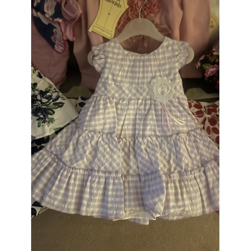 202 - Matilda’s Wardrobe- selection of  high end child/infant new with tags dresses, skirts and tops