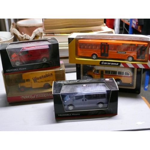 208 - 5 boxed vehicles to include 2 Vauxhall Vivaro vans, Weetabix truck, Malta bus and Cararama bus
