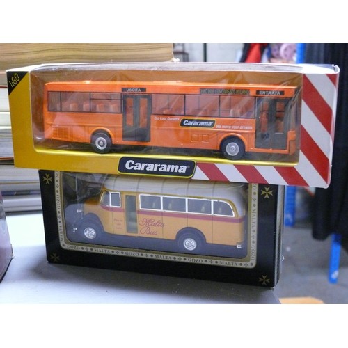 208 - 5 boxed vehicles to include 2 Vauxhall Vivaro vans, Weetabix truck, Malta bus and Cararama bus