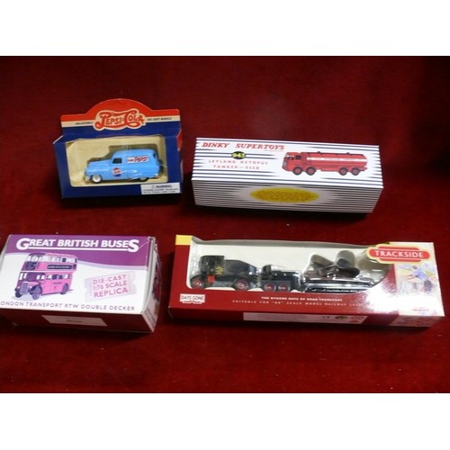 222 - 4 boxed model vehicles to include Dinky Leyland Octopus, British buses, trackside vehicle etc