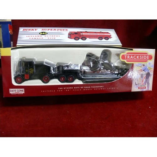 222 - 4 boxed model vehicles to include Dinky Leyland Octopus, British buses, trackside vehicle etc