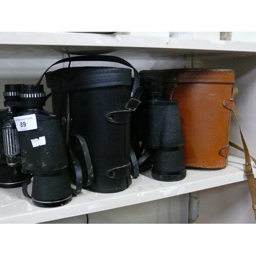 89 - 2 pairs of binoculars, both with carry cases