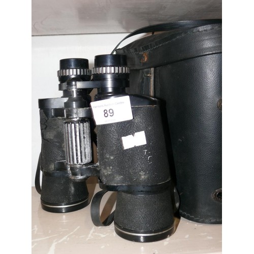 89 - 2 pairs of binoculars, both with carry cases