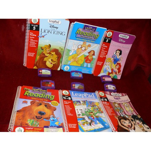 183 - Leapfrog LeapPad with books and cartridges plus a T Rex book and model