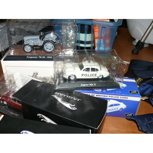 207 - 4 boxed vehicles 3 Jaguars plus a Ferguson tractor