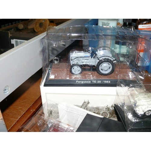 207 - 4 boxed vehicles 3 Jaguars plus a Ferguson tractor