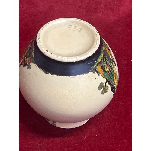 5 - An unusual Art Deco vase decorated with a fairy castle design, impressed number ‘224’ to base. 
11cm
