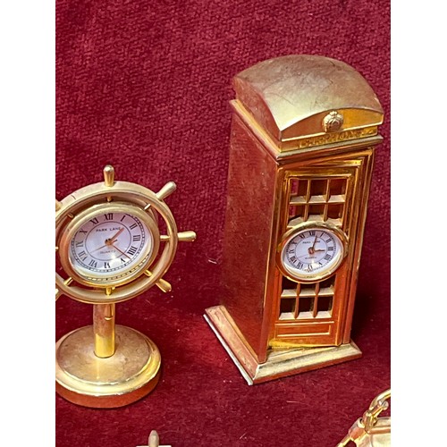 15 - Collection of gilt metal novelty clocks including telephone box, coffee machine, Tilly lamp etc