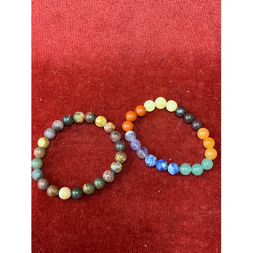17 - Five natural stone bead bracelets including red netstone, jasper, aventurine