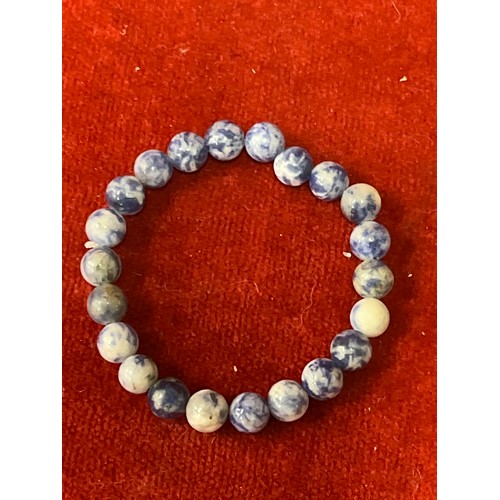17 - Five natural stone bead bracelets including red netstone, jasper, aventurine