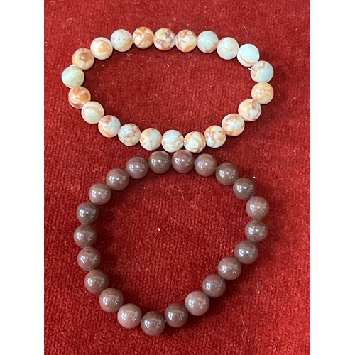 17 - Five natural stone bead bracelets including red netstone, jasper, aventurine