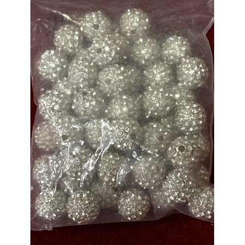 27 - Bag of Rhinestone spacers and crackle beads