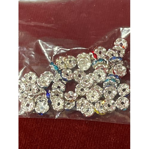27 - Bag of Rhinestone spacers and crackle beads