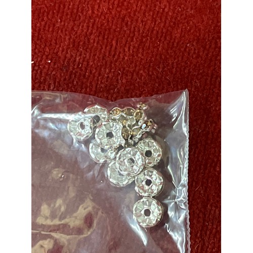 27 - Bag of Rhinestone spacers and crackle beads