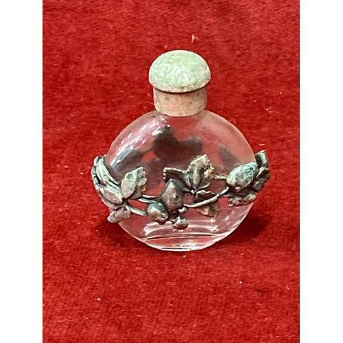 8 - 5 scent bottles including two Edwardian cut glass with sterling silver lids hallmarked Birmingham 19... 