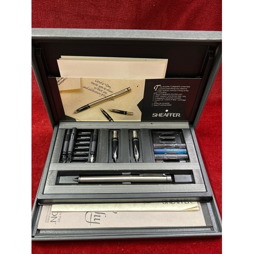 60 - A Sheaffer Calligraphy set with pen, inks and practice pad