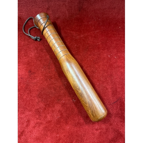 61 - A good quality heavy hardwood fishing priest