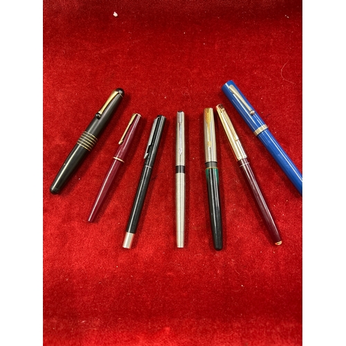 63 - Six fountain pens including four by Parker a fat egg pen probably by Colibri of London, the nib mark... 