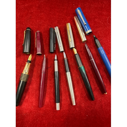 63 - Six fountain pens including four by Parker a fat egg pen probably by Colibri of London, the nib mark... 
