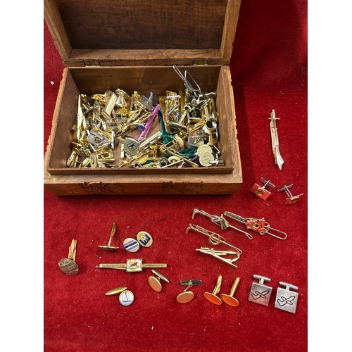 68 - Vintage Indian carved wood box full of cufflinks & tie pins. Includes equestrian themed tie clips,  ... 