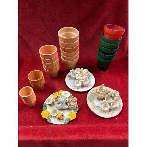 74 - Three miniature novelty teasets decorated with teddy bears and chickens and also miniature terracott... 