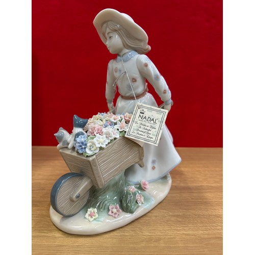 79B - Nadal Spanish porcelain figurine of a girl pushing a wheelbarrow, new with box and packaging