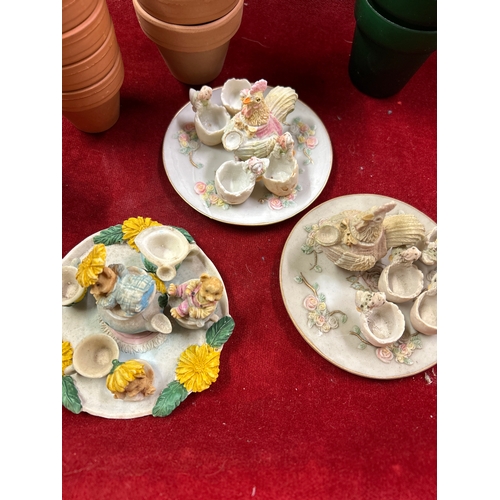 74 - Three miniature novelty teasets decorated with teddy bears and chickens and also miniature terracott... 
