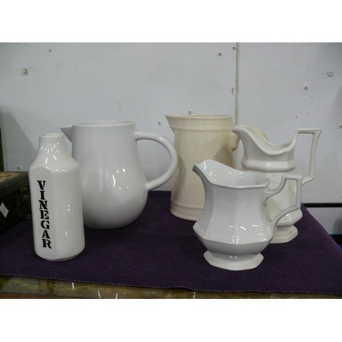 165 - Quantity of white and cream ceramic jugs and bottles