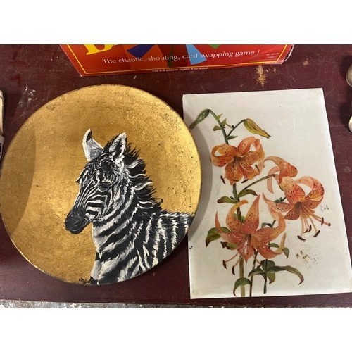 392 - Hand painted lilies on glass and a zebra plate
