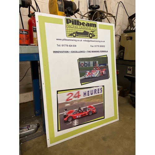 52 - Pilbeam Racing Designs Ltd promotional board - “Innovation + Excellence = The Winning Formula”. Depi... 
