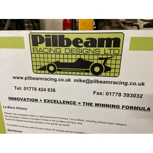 54 - Pilbeam Racing Designs Ltd promotional board - “Innovation + Excellence = The Winning Formula”. Incl... 