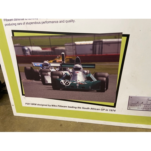54 - Pilbeam Racing Designs Ltd promotional board - “Innovation + Excellence = The Winning Formula”. Incl... 