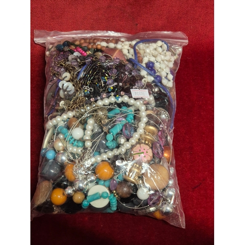 66 - 2 large bags of mixed costume jewellery