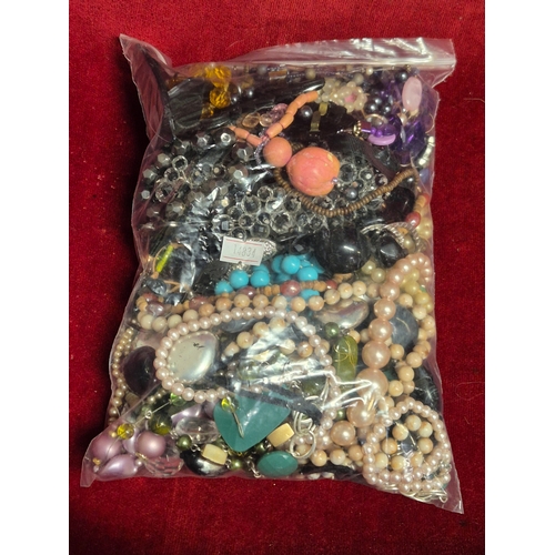 66 - 2 large bags of mixed costume jewellery