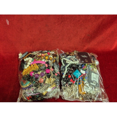 68 - 2 large bags of mixed costume jewellery