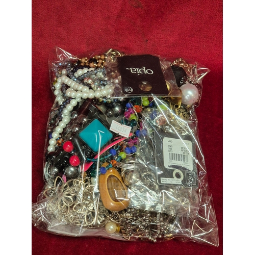 68 - 2 large bags of mixed costume jewellery
